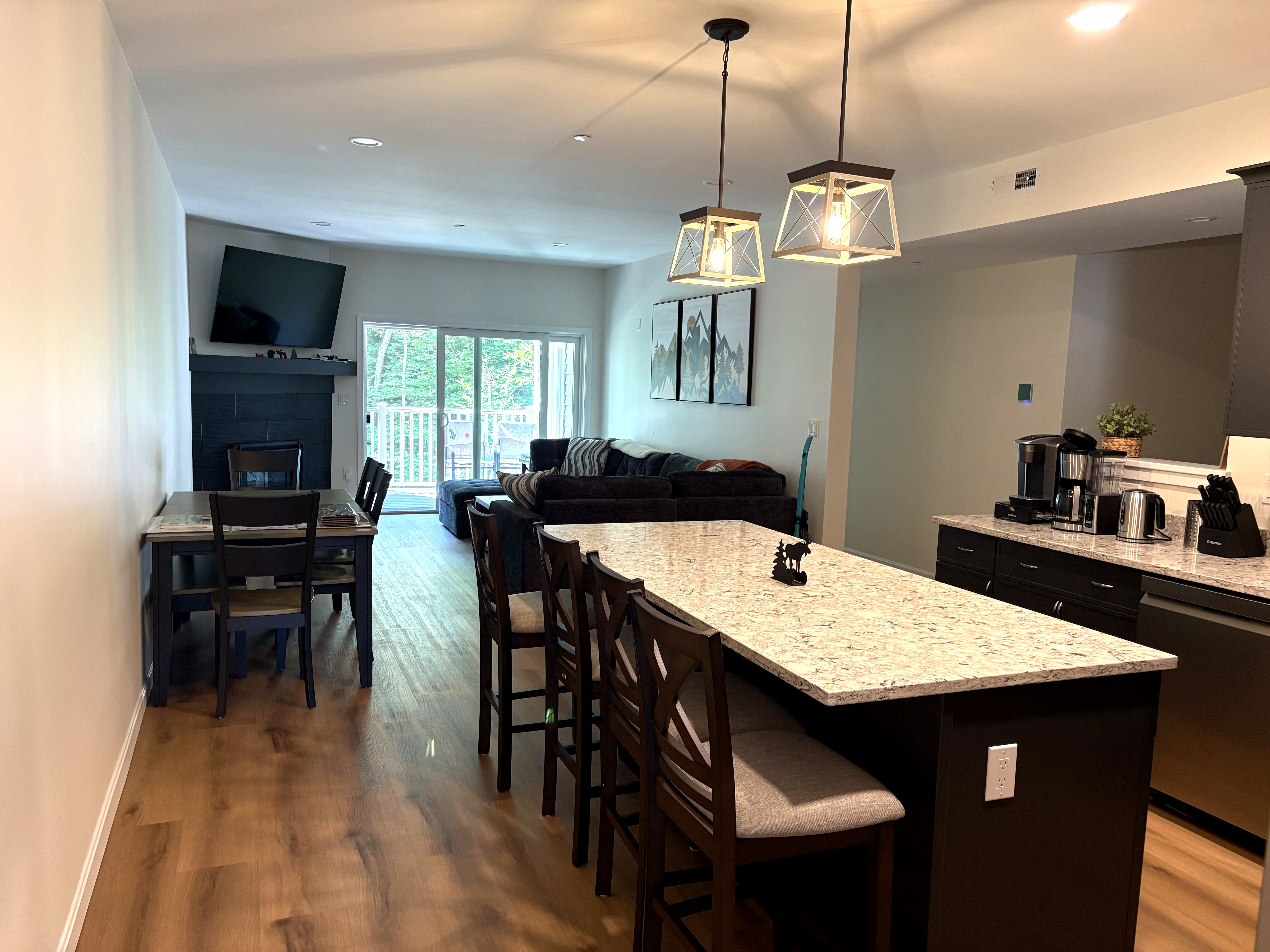 Open-concept kitchen and living room at Alpine Hideaway